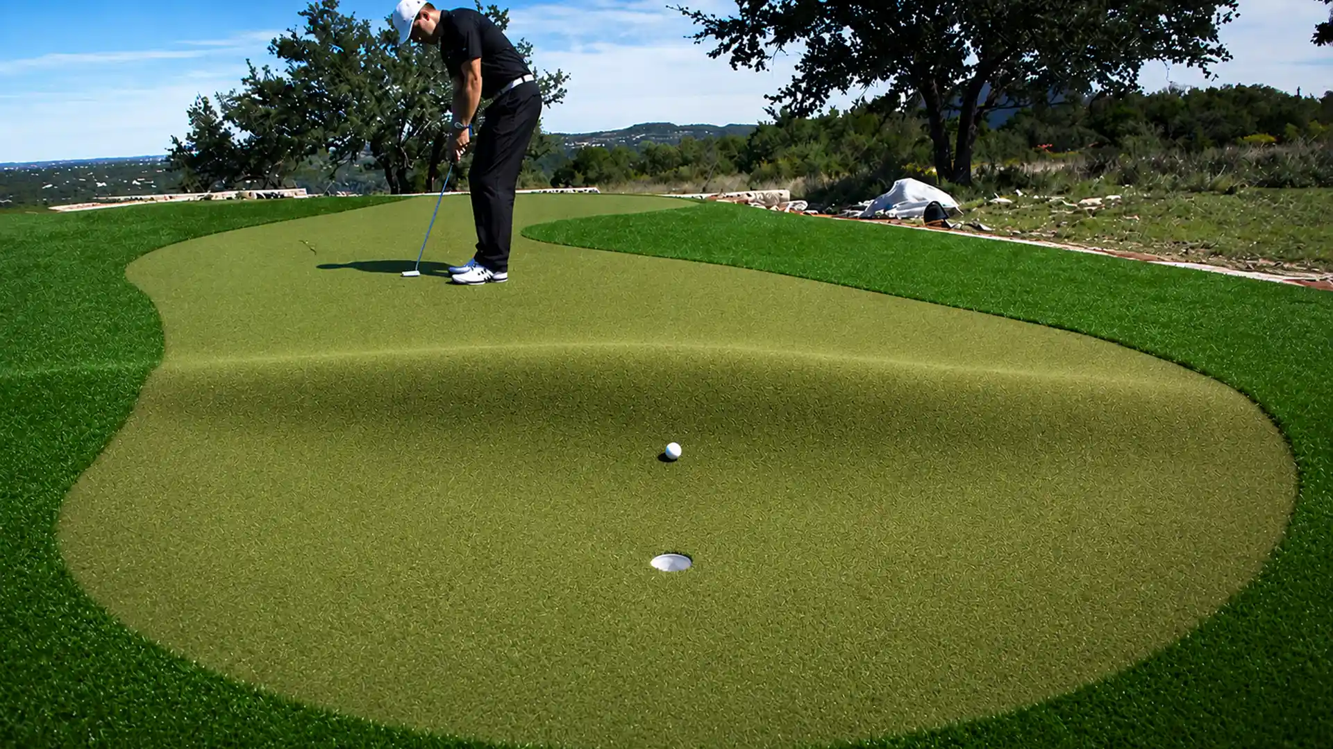 image of golfer putting over humps practice drill