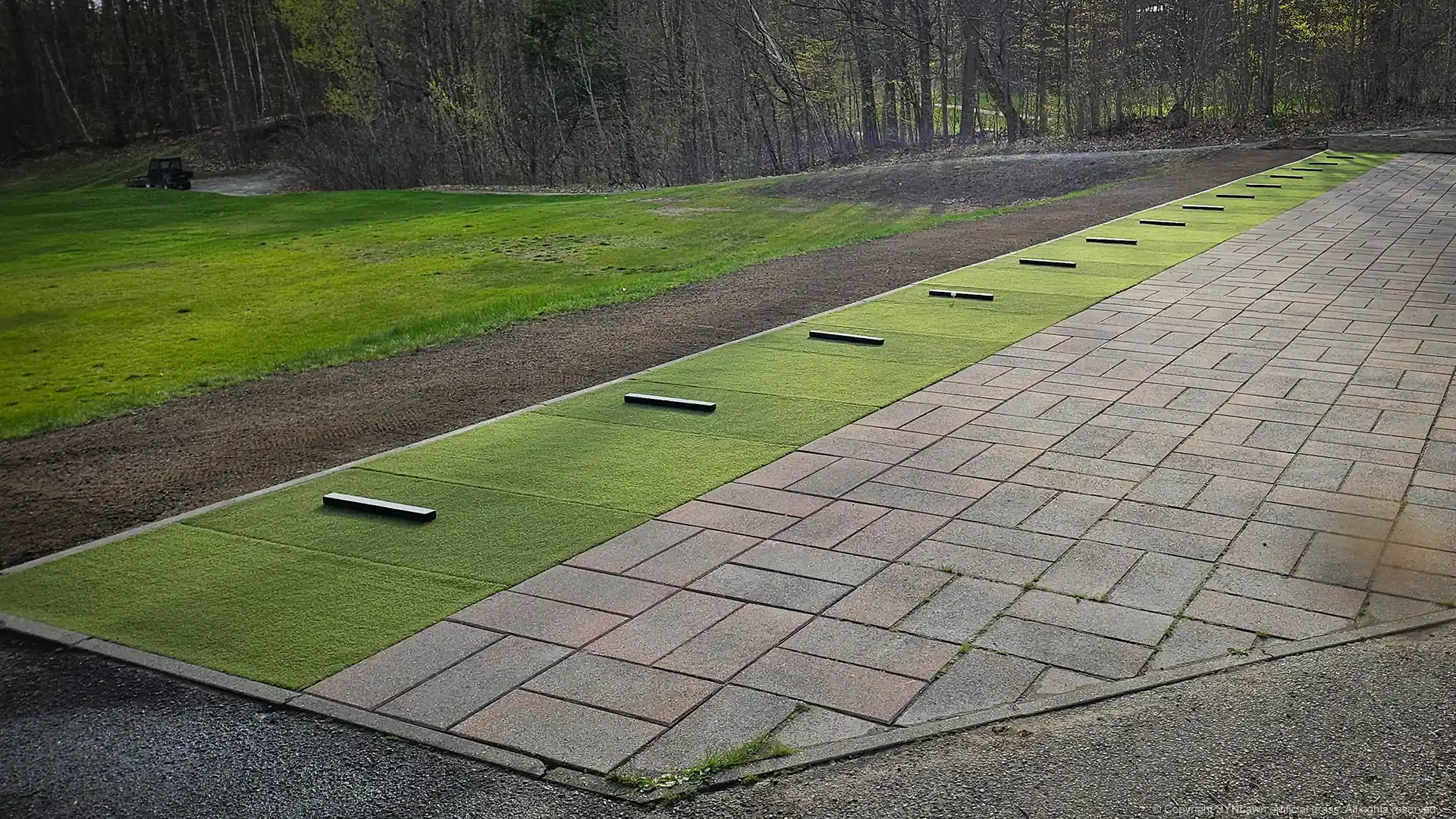 image of synthetic tee line using SYNLawn Golf's Tee Strike golf turf for driving ranges and tee boxes