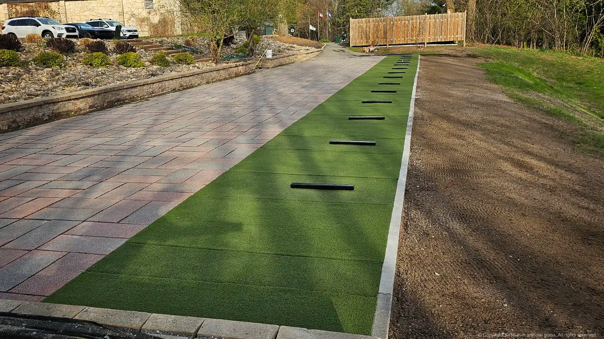 image of synthetic tee line using SYNLawn Golf's Tee Strike golf turf for driving ranges and tee boxes
